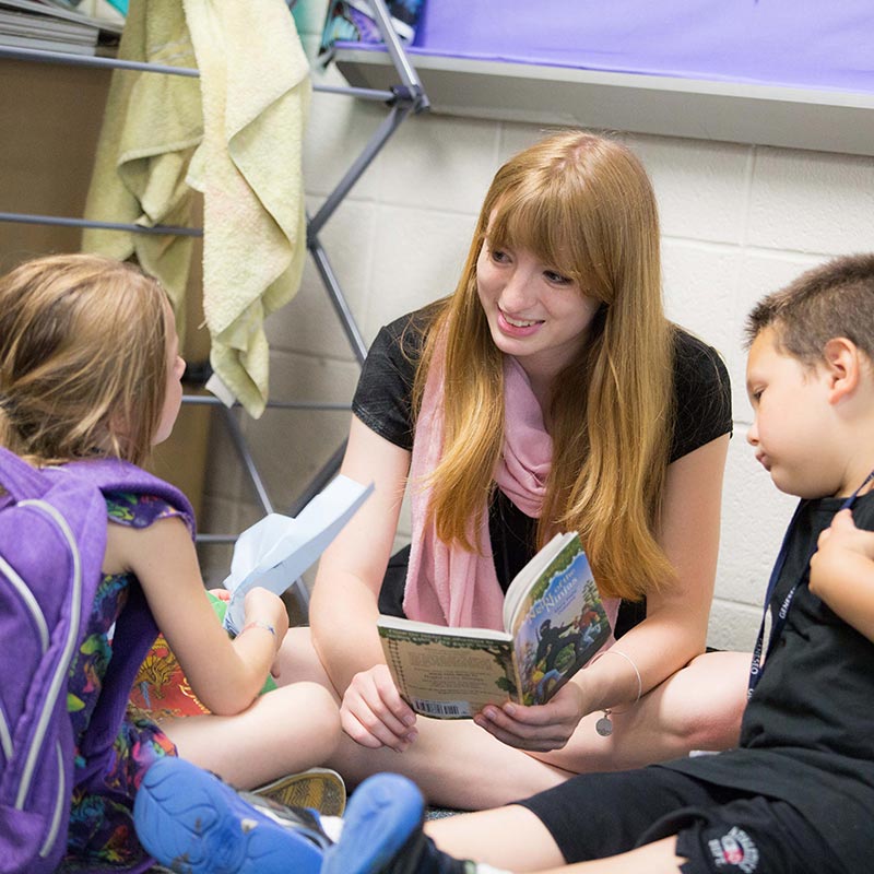 teacher reading to kids