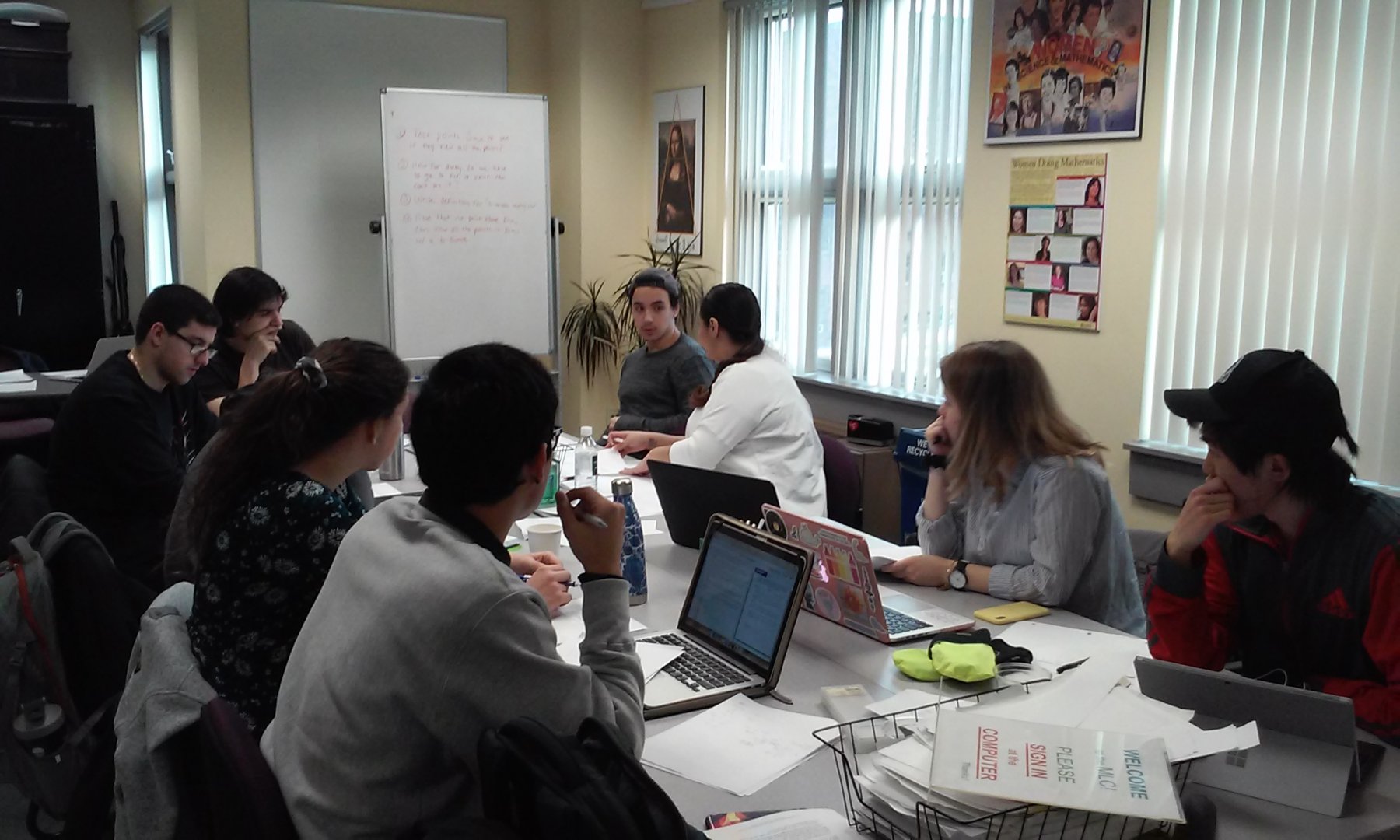 Dr. Pamela Harris lead a group of students working on a problem on Invisible Lattice Points.6