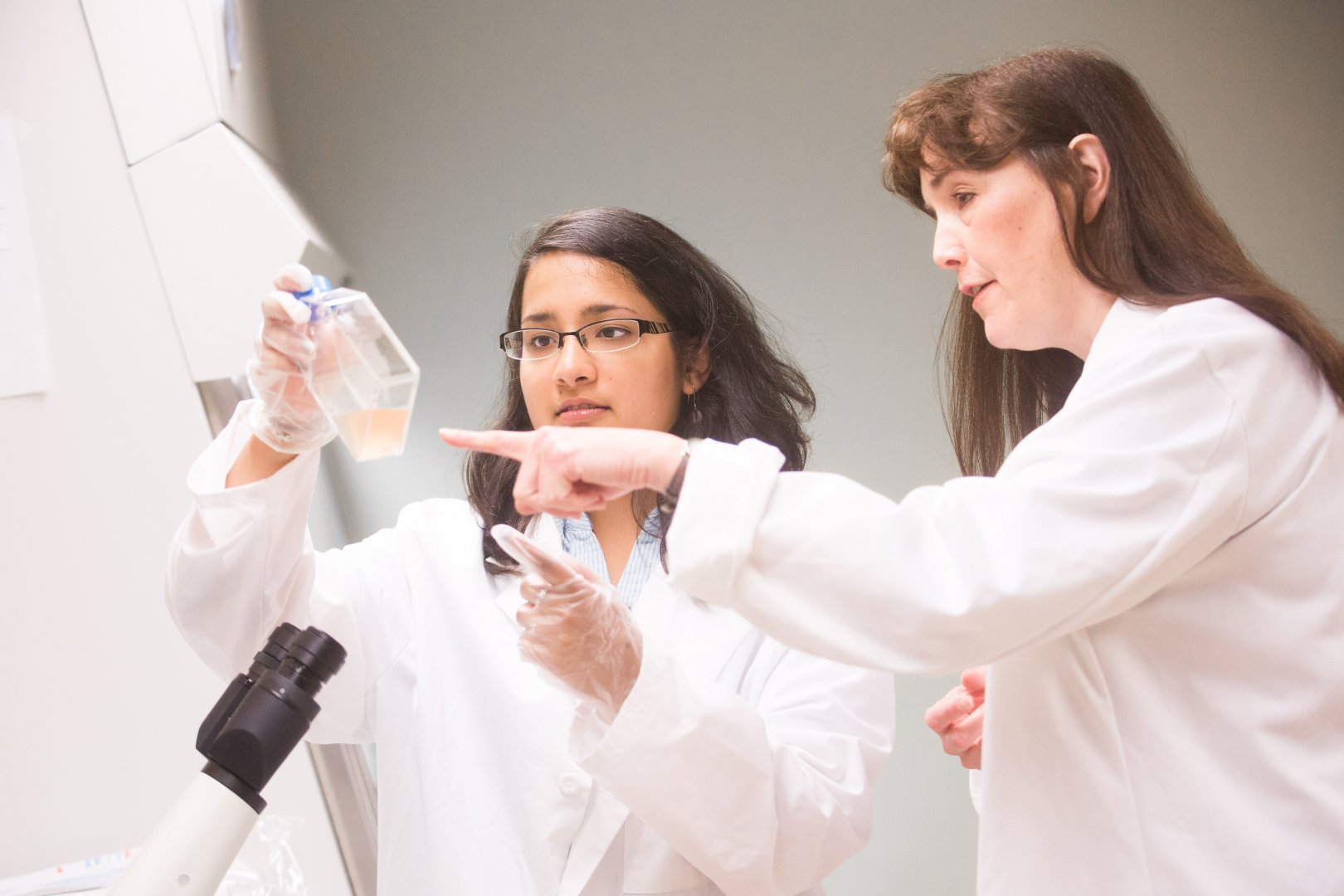 Chemistry instructor and student in laboratory