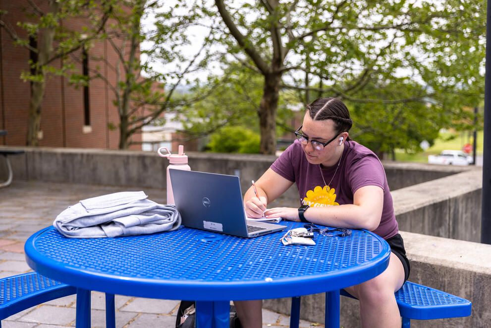 Student studying outside