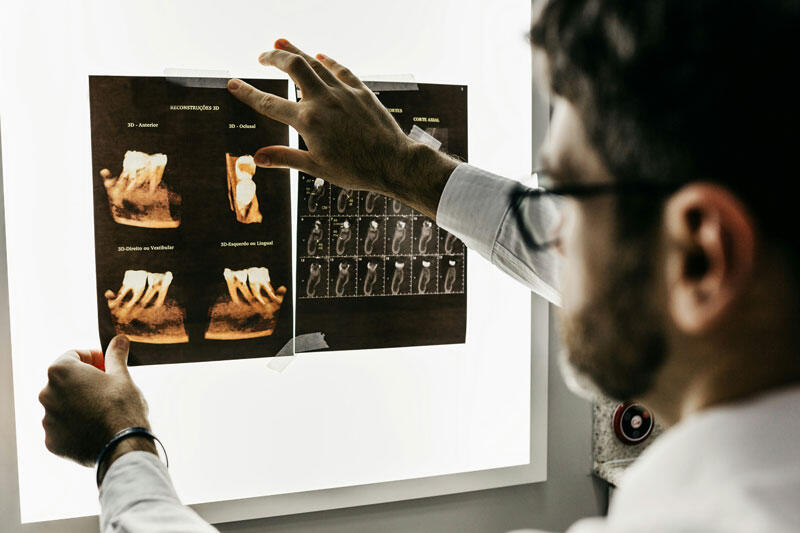 dentist examining xrays