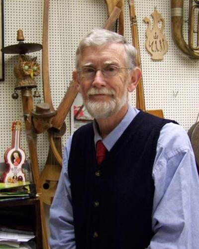 James Kimball in a room full of instruments.