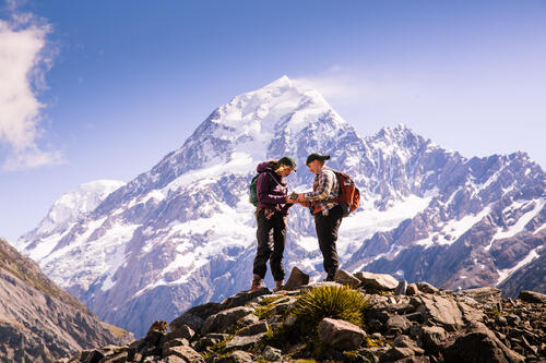 Two students compare field notes during a study abroad trip in 2016 to New Zealand. (SUNY Geneseo/Keith Walters '11)