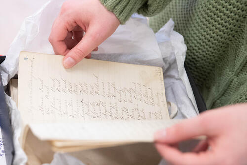 Students reading old manuscripts (SUNY Geneseo/Keith Walters)