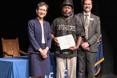 Kodjo Adabra accepts award