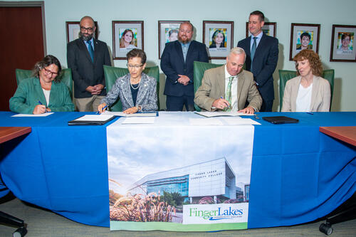 college leaders signing contract