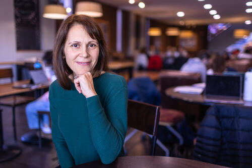 Meredith Harrigan at a table in the Union