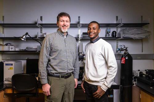 Associate professor of biology Travis Bailey and Muwafaq Ibrahim ’25