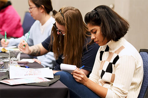 Real World Geneseo students attending a workshop.