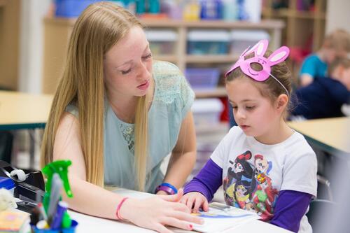 geneseo student teacher with child