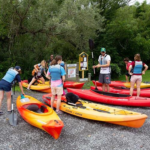 People with kayaks