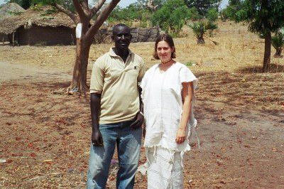 Wearing traditional fula dress with a young man.